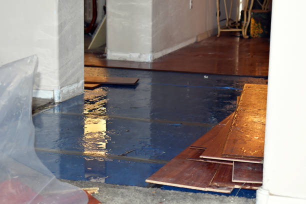 Professional Flood Damage Restoration technician working in Arvin, CA